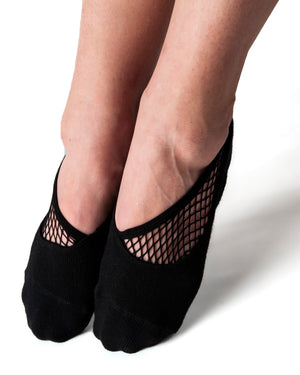 Black ankle height, scooped grip socks with a diagonal mesh panel extending from the outside of the ankle to the top of the toes.