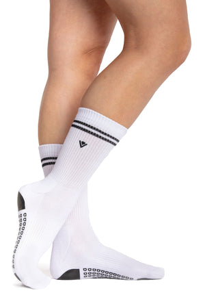 White crew socks with black stripe detailing at the top of the sock and embroidered Arebesk logo.