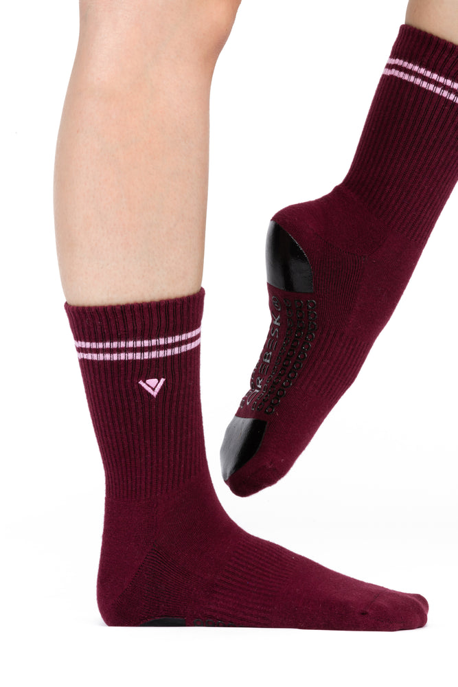 Burgundy crew socks with pink stripe detailing at the top of the sock and embroidered Arebesk logo.